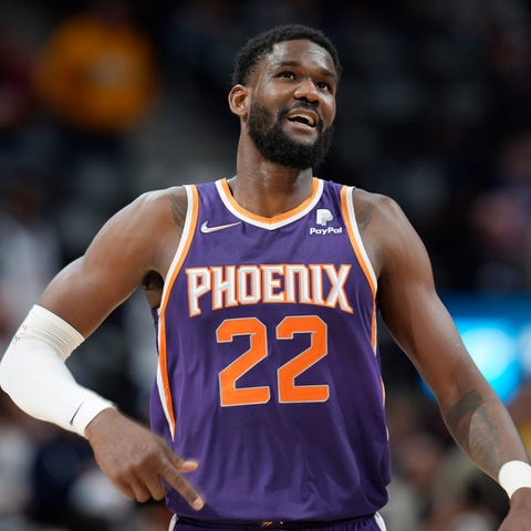 FILE - Phoenix Suns center Deandre Ayton looks on 