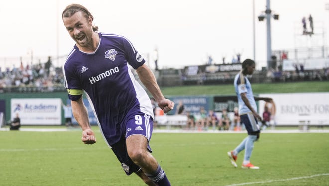 Louisville City FC forward Matt Fondy celebrates following his first of what would become three goals in the first half against Harrisburg City Islanders on Wednesday night. Sept. 3, 2015