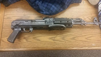 Tulare County detectives also located an assault rifle concealed in the front.