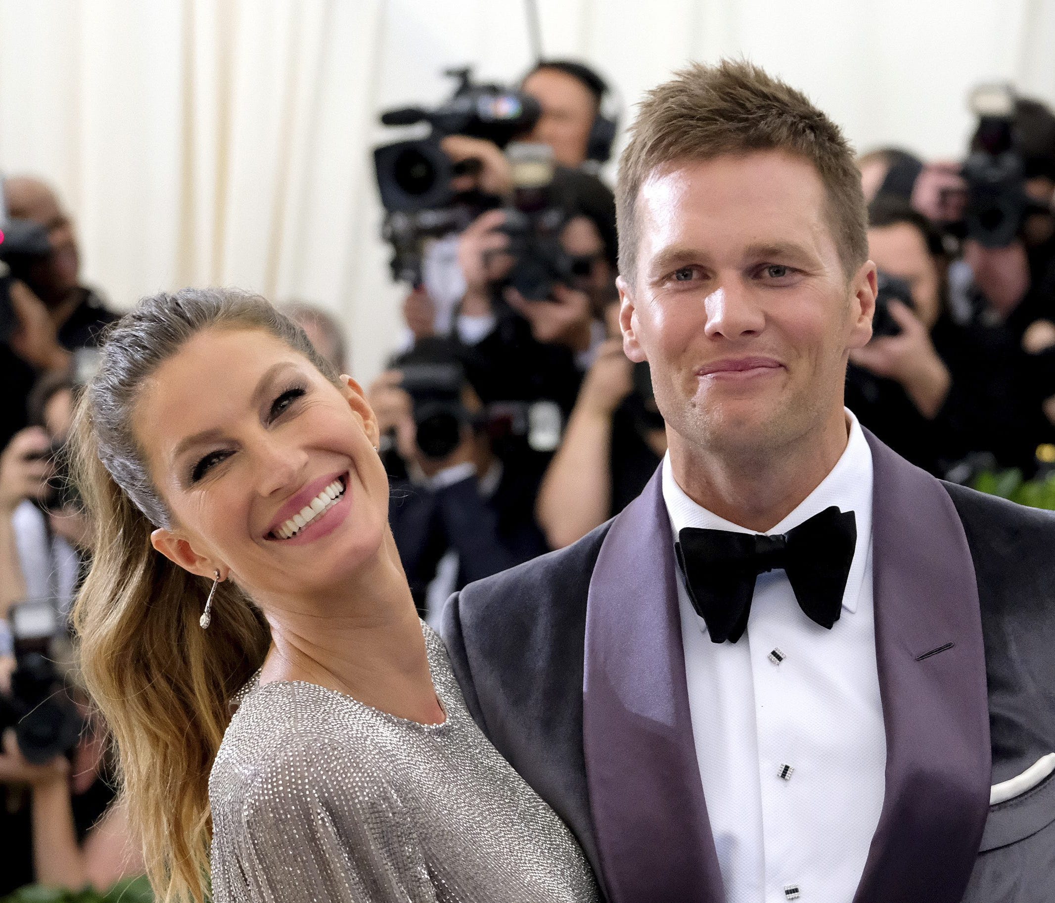 FILE - In this May 1, 2017, file photo, Gisele Bundchen, left, and Tom Brady attend The Metropolitan Museum of Art's Costume Institute benefit gala celebrating the opening of the Rei Kawakubo/Comme des Garçons: Art of the In-Between exhibition in New