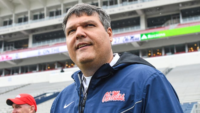 Ole Miss head coach Matt Luke walks onto the field for the Grove Bowl spring NCAA college football game at Vaught-Hemingway Stadium in Oxford, Miss. on Saturday, April 7, 2018.