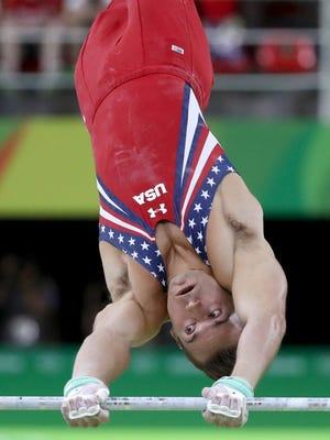 American Sam Mikulak performs Tuesday afternoon in Rio.