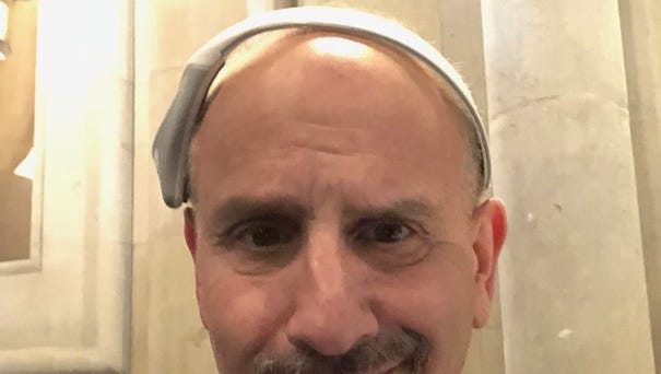 Ed Baig wears Modius weight loss headset during...