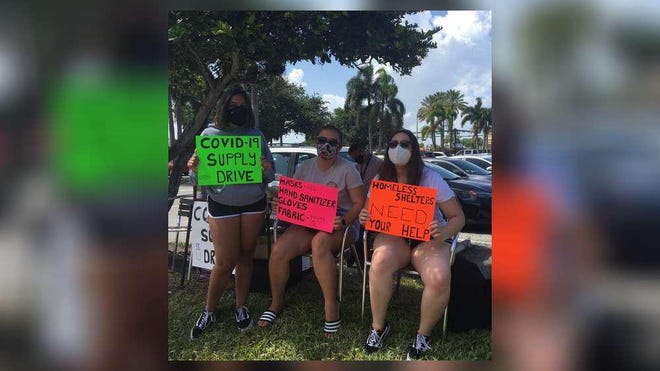 From left: Boca Raton High School students Aqsa Patel, Katlyn Brown and Makayla Rothman held a coronavirus supply drive for the homeless in July in the Whole Foods parking lot in Boca Raton.