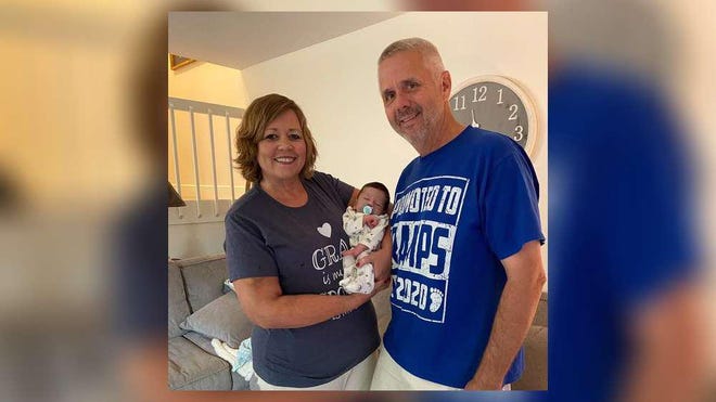 Andrea Feder with her husband, Jeff, and newborn grandson, Lyles. Medical staff at Palm Beach Gardens Medical Center saved Andrea's life after a blood clot lodged in her pulmonary artery.