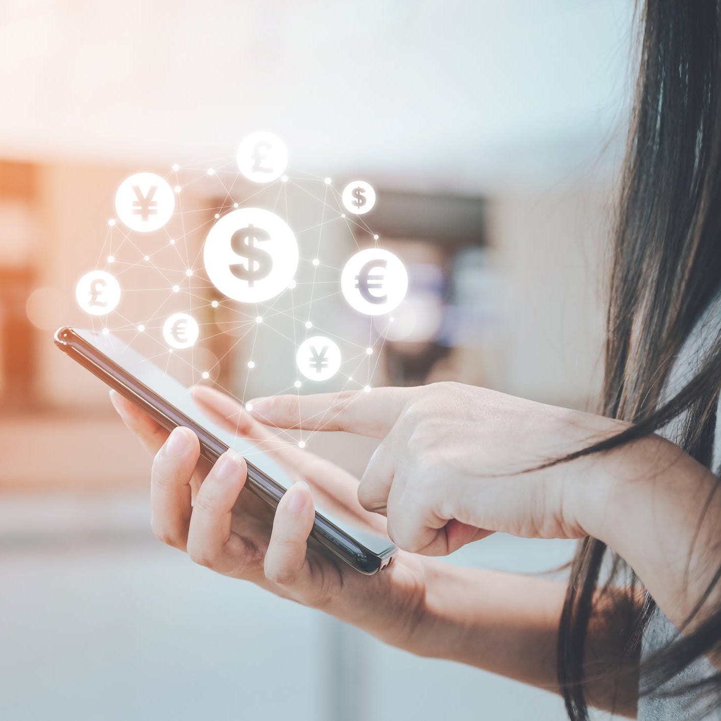 A woman uses a digital payments app.