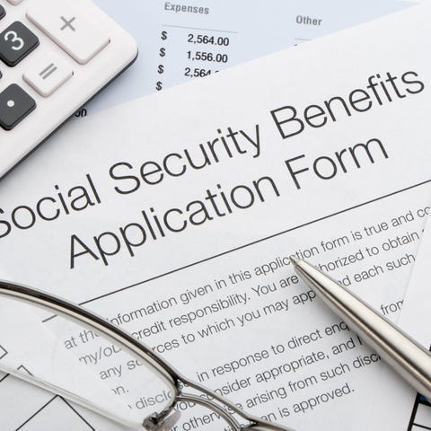 A Social Security benefits application form lying 