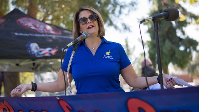 Kelli Ward, a former state senator challenging incumbent U.S. Sen. John McCain in the state's 2016 Republican Senate primary, speaks at a Second Amendment rally at the State Capitol on Feb. 20, 2016.