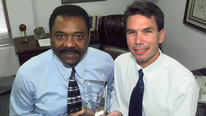 Chairman David Steward, left, and President and Chief Operating Offer Jim Kavanaugh of World Wide Technology, Inc., in St. Louis show their award for being selected company of the year in 1999 by Black Enterprise magazine.