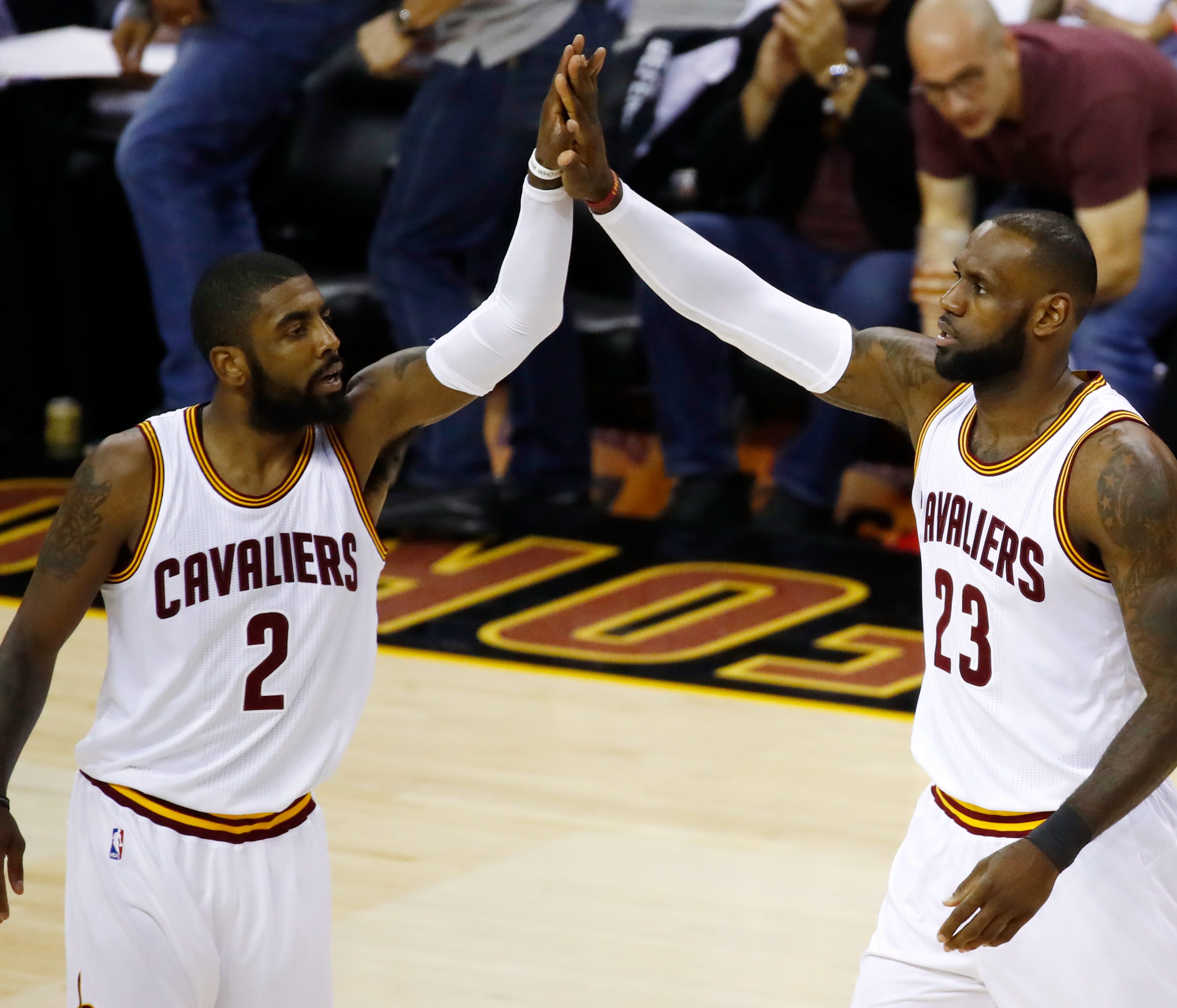 CLEVELAND, OH - JUNE 09: Kyrie Irving #2 and LeBron James #23 of the Cleveland Cavaliers high five against the Golden State Warriors in Game 4 of the 2017 NBA Finals at Quicken Loans Arena on June 9, 2017 in Cleveland, Ohio. NOTE TO USER: User expres
