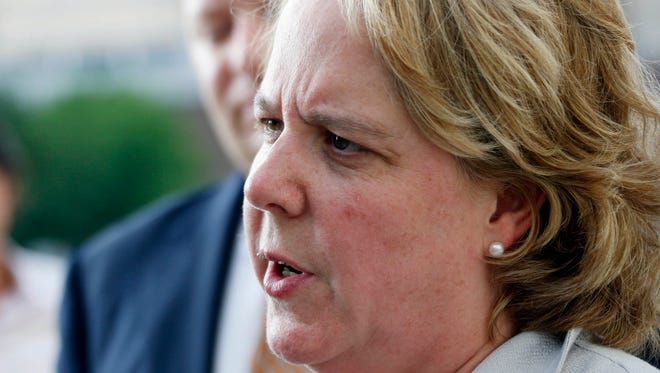 Roberta Kaplan, a New York-based attorney, representing Campaign for Southern Equality and a lesbian couple, speaks with reporters following a day of testimony at the federal courthouse in Jackson.