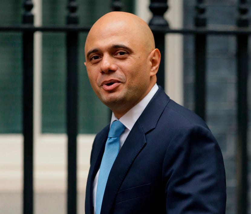 In this file photo dated Tuesday, Oct. 10, 2017, Sajid Javid arrives for a meeting at 10 Downing Street in London.