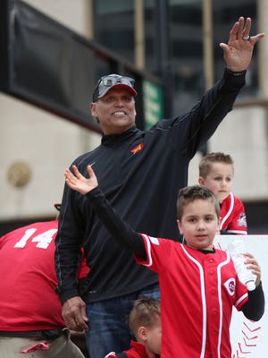 Anthony Munoz, former Cincinnati Bengals left tackle and NFL Hall of Famer, waves to the crowd during the 96th Findlay Market Opening Day Parade at Fountain Square on Monday, April 6. Munoz sees similarity in the start to his NFL career and that of Bengals 2015 first-round pick Cedric Ogbuehi.