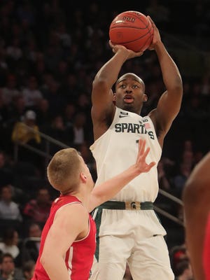 Michigan State guard Joshua Langford scores against Wisconsin guard Brevin Pritzl during during the first half of the Big Ten tournament quarterfinal on Friday, March 2, 2018, at Madison Square Garden.