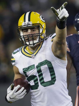 Green Bay Packers linebacker Blake Martinez (50) intercepts a pass during the fourth quarter against the Chicago Bears at Lambeau Field.