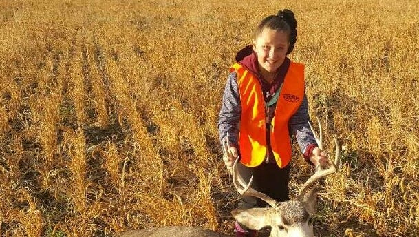 Taylor Whitfield got this mule deer on her first hunt.