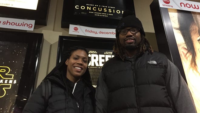 Lions defensive end Darryl Tapp with his wife, Tiffany, at Theatre 6 at AMC Livonia.
