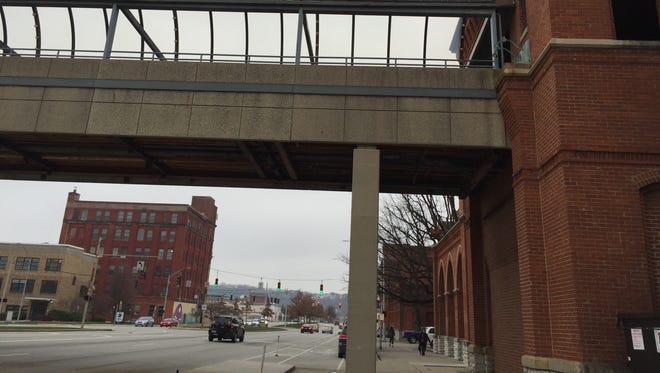 The city says the bridge over Central Parkway into Music Hall must go.