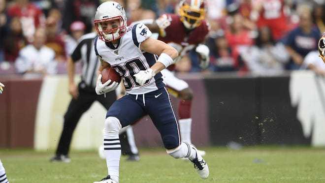 New England Patriots wide receiver Gunner Olszewski runs with the ball during the first half of an NFL football game against the Washington Redskins, Sunday, Oct. 6, 2019, in Washington. Olszewski made the team last year thanks to his performance in pre-season games. The NFL Players Association recently voted to have no preseason games this year due to the coronavirus pandemic after the NFL had agreed to cut the preseason in half to two games.