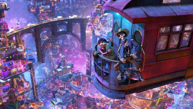 UNLIKELY DUET -- In Disney•Pixar’s “Coco,” aspiring musician Miguel (voice of Anthony Gonzalez) teams up with charming trickster Hector (voice of Gael García Bernal) on a life-changing journey through the Land of the Dead. Directed by Lee Unkrich, co-directed by Adrian Molina and produced by Darla K. Anderson, Disney•Pixar’s “Coco” opens in U.S. theaters on Nov. 22, 2017. ©2017 Disney•Pixar. All Rights Reserved.
