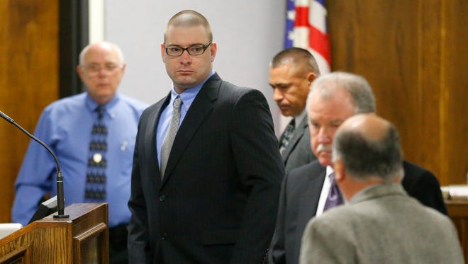 Former Marine Cpl. Eddie Ray Routh, center, appears in court on the opening day of his capital murder trial at the Erath County Donald R. Jones Justice Center, Wednesday, Feb. 11, 2015, in Stephenville, Texas. Routh, 27, of Lancaster, Texas, is charged with the 2013 deaths of former Navy SEAL Chris Kyle and his friend Chad Littlefield at a shooting range near Glen Rose, Texas.