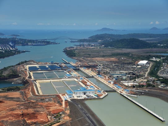 An aerial view of the expanded Panama Canal at the