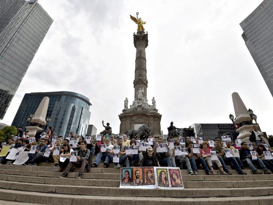 Journalists protest against violence during the commemoration