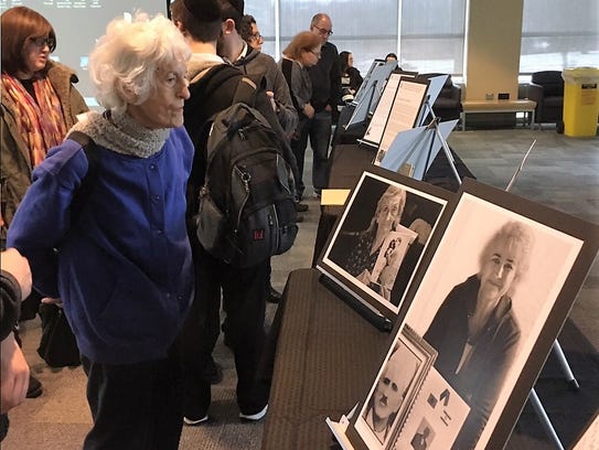 An attendee looks at the display at the International