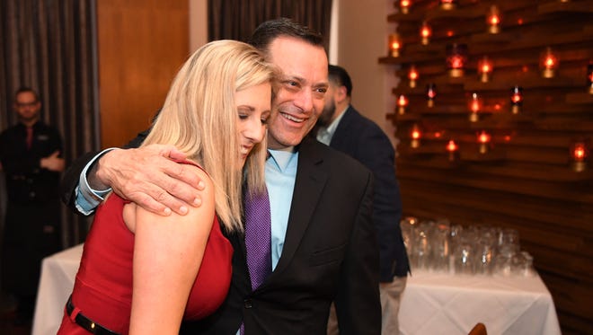 Ericka Downey meets Billy Gillispie for the first time. Downey, wife of college basketball coach Mark Downey of Northeastern State, is donating a kidney to Gillispie.
