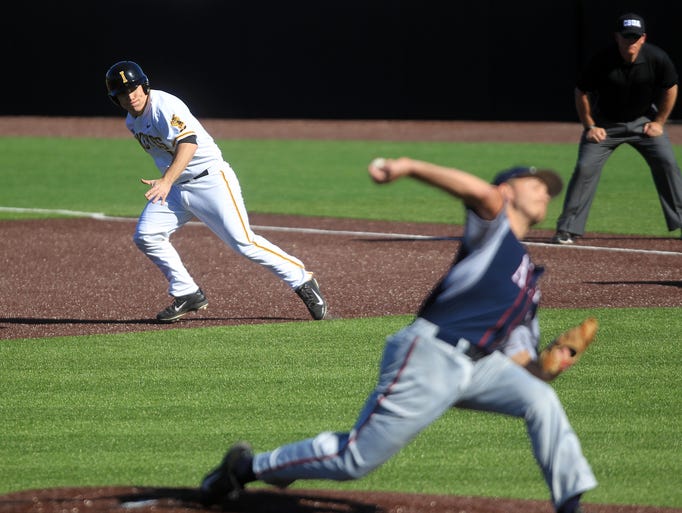 Iowa's Sean Moore takes off to second base during the