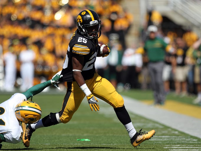 Iowa running back Akrum Wadley runs down field during