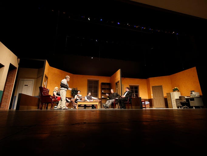 The cast rehearse Act 2 of the play "Getting Away with
