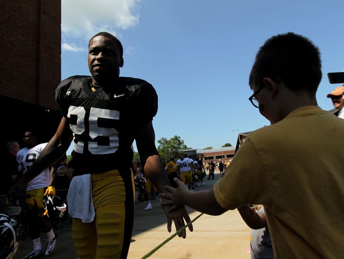Iowa running back Akrum Wadley enters Kinnick Stadium