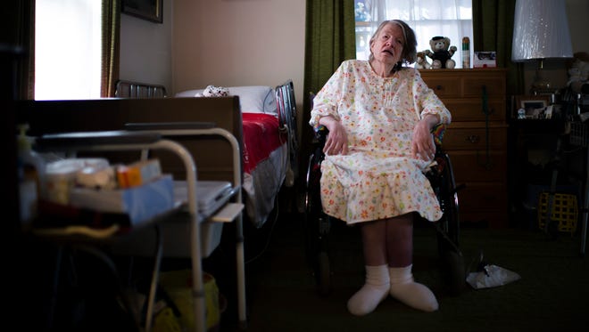 Alice Smith, 68, who is disabled, is pictured inside her Haddonfield home.
