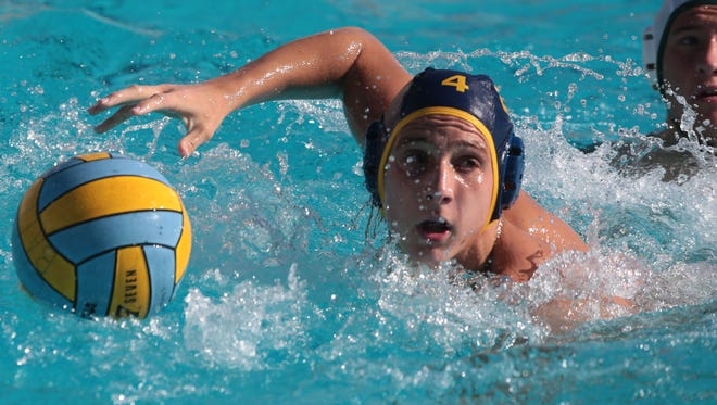 La Quinta's Spencer Lowell scores against Bonita during the CIF first round water polo match on Wednesday in La Quinta.