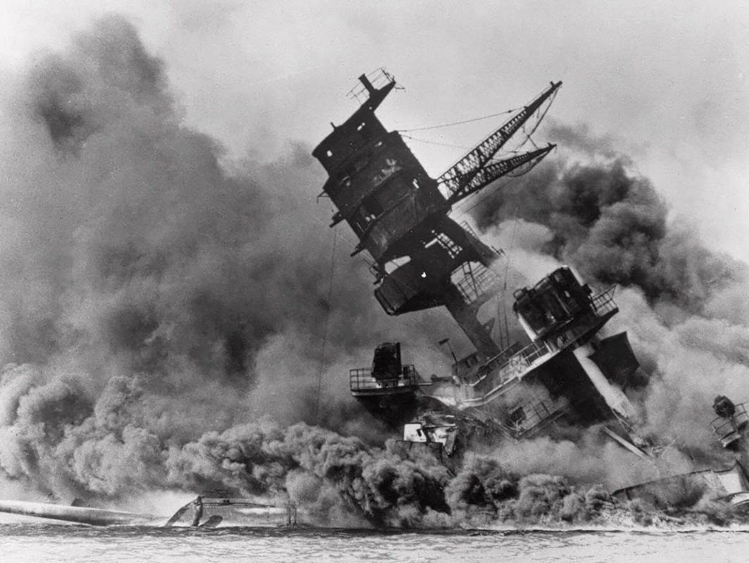 FILE - In this Dec. 7, 1941 file photo, smoke rises from the battleship USS Arizona as it sinks during a Japanese surprise attack on Pearl Harbor, Hawaii. Saturday marks the 72nd anniversary of the attack that brought the United States into World War