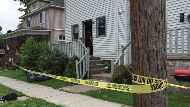 Police tape marks a home where a male was possibly stabbed Thursday in the 1200 9th Street in Port Huron.
