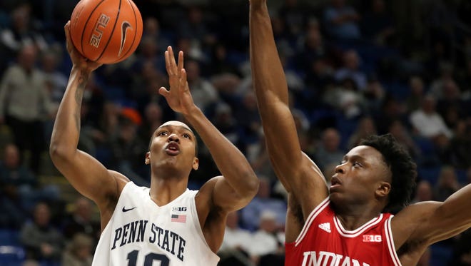 Penn State's Tony carr (10) goes to the basket as Indiana's Og Anunoby (3) defends during the first half of an NCAA college basketball game in State College, Pa., Wednesday, Jan. 18, 2017. (AP Photo/Chris Knight)