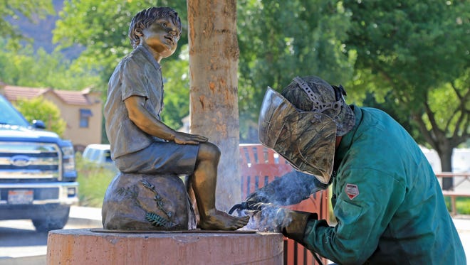 “Eyes of Wonder” by Nebraska sculptor Sondra Jonson is installed Tuesday morning near the Hurricane Community Center and Splash Pad.