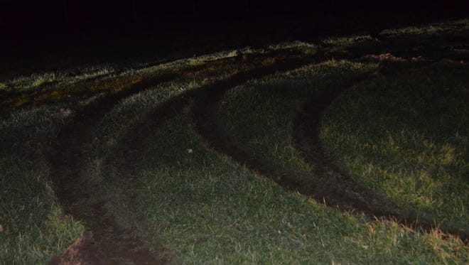 A field at Rockland Community College was allegedly damaged by two drivers doing 'doughnuts.'