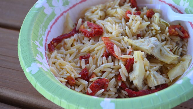 This Lemony Orzo with Sun-dried Tomatoes, Basil and Artichokes improves after a day or two, so it’s a perfect side dish for camping.
