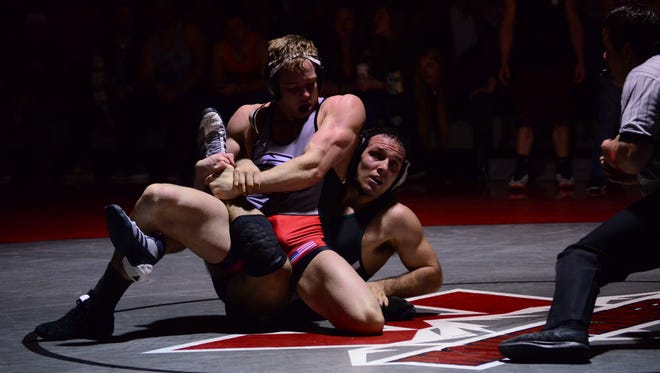 Rocky Mountain High School graduate Konnor Schmidt, shown on the left in a file photo, earned Division II All-American status at 197 pounds this season as a redshirt  sophomore.