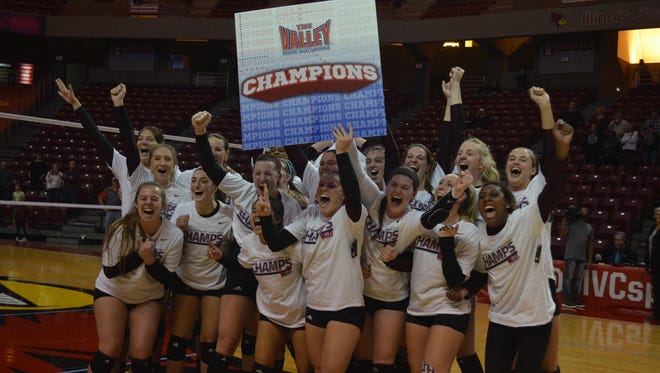 Missouri State volleyball players celebrate their Missouri Valley Conference championship win against Northern Iowa on Saturday in Normal, Illinois.