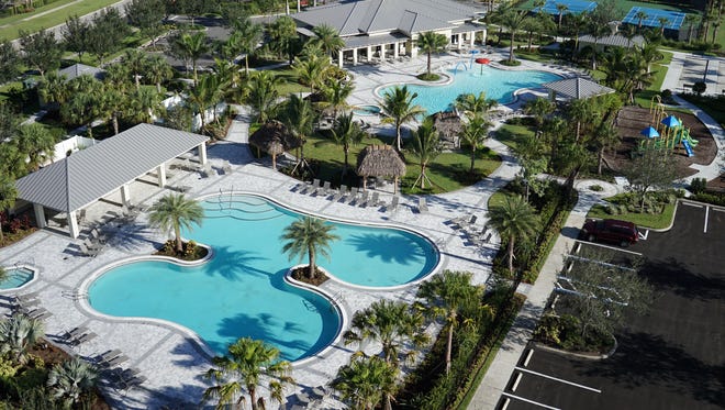The Ronto Group’s Orange Blossom Naples community’s resort-style amenities include two large pools and a spa that serve as the centerpiece of the community’s amenity offering.