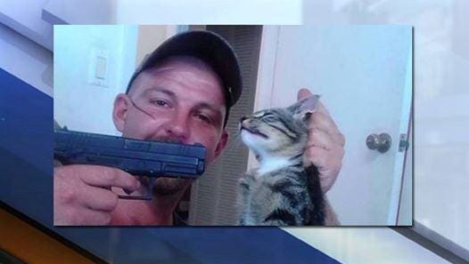Facebook photo of Thomas McGuinness pointing a gun at a cat prompted an investigation.
