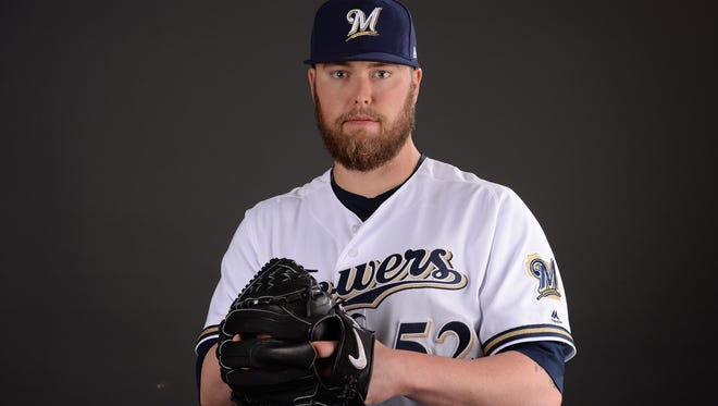 Brewers pitcher Jimmy Nelson poses for a photo during spring training.