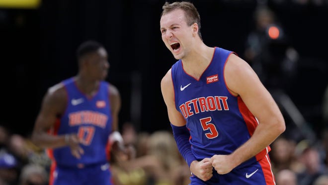 Detroit Pistons' Luke Kennard reacts after hitting a shot during the second half of the team's NBA basketball game against the Indiana Pacers, Wednesday, Oct. 23, 2019, in Indianapolis. Detroit won 119-110. (AP Photo/Darron Cummings)