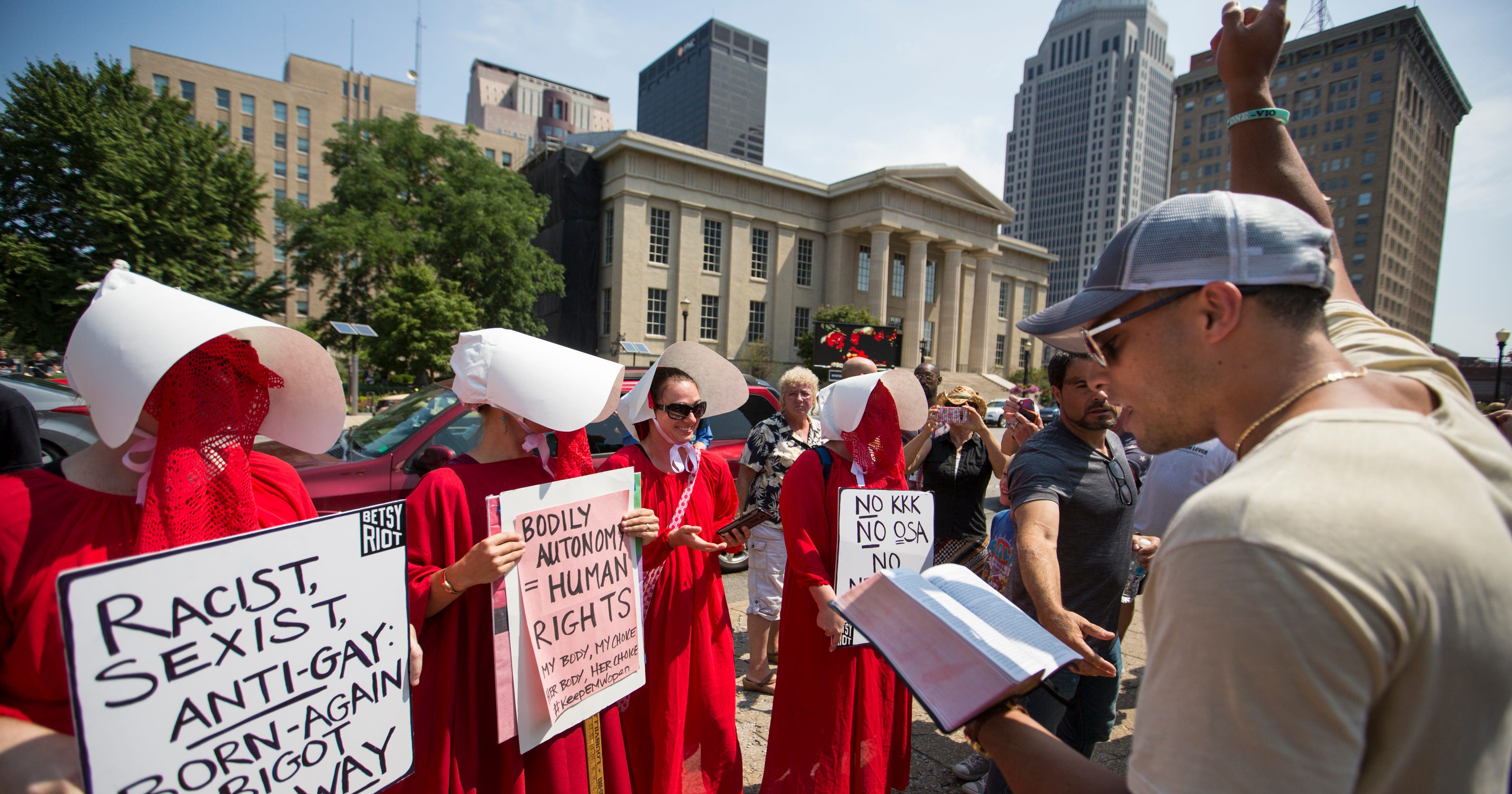 Louisville abortion protesters, opponents swap insults near City Hall