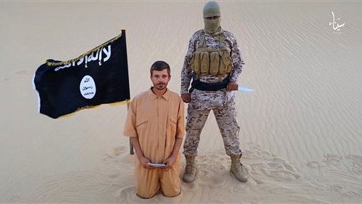 FILE - This image made from a militant video posted on a social media site on Wednesday, Aug. 5, 2015, which has been verified and is consistent with other AP reporting, purports to show a militant standing next to another man who identifies himself as 30-year-old Tomislav Salopek, kneeling down as he reads a message at an unknown location. The video purportedly released by the Islamic State group threatened to kill the Croatian hostage if Egyptian authorities do not release "Muslim women" held in prison within 48 hours. The sister of a woman jailed in Egypt for alleged ties to the outlawed Muslim Brotherhood is urging the Islamic State group not to kill the Croatian hostage. (Militant video via AP, File)