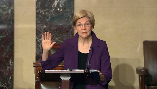 In this image from Senate Television, Sen. Elizabeth Warren, D-Mass., speaks on the floor of the U.S. Senate in Washington, Feb. 6, 2017, about the nomination of Betsy DeVos to be Education Secretary. The Senate will be in session around the clock this week as Republicans aim to confirm more of President Donald Trump's Cabinet picks over Democratic opposition.
